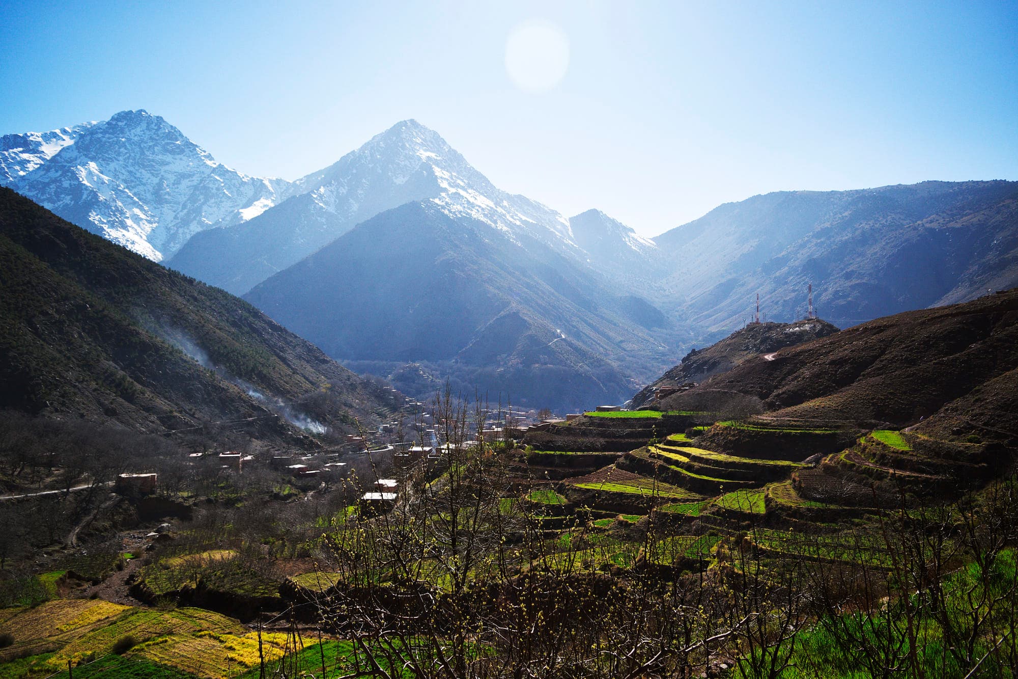 High Atlas mountains snow-capped peaks above Berber villages, Morocco